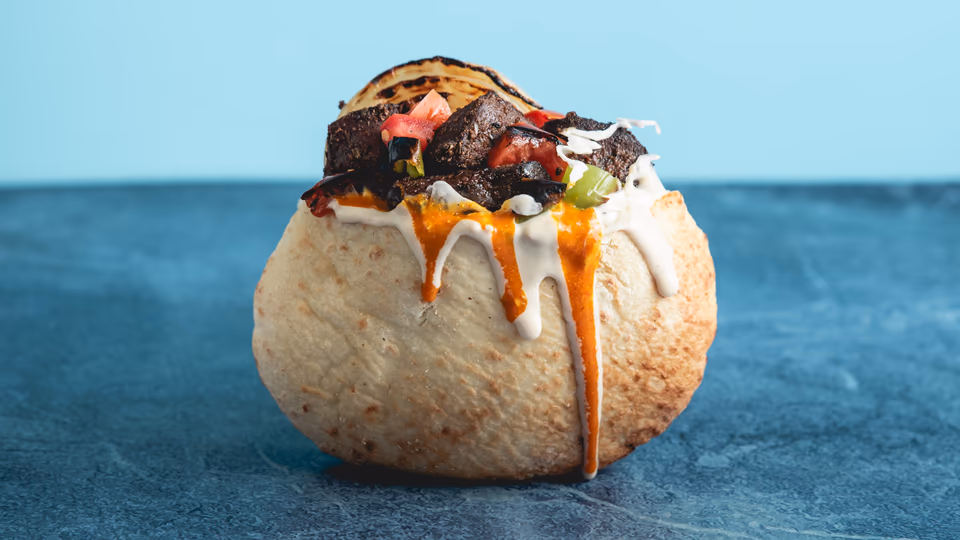 Veal served inside a pita with veg